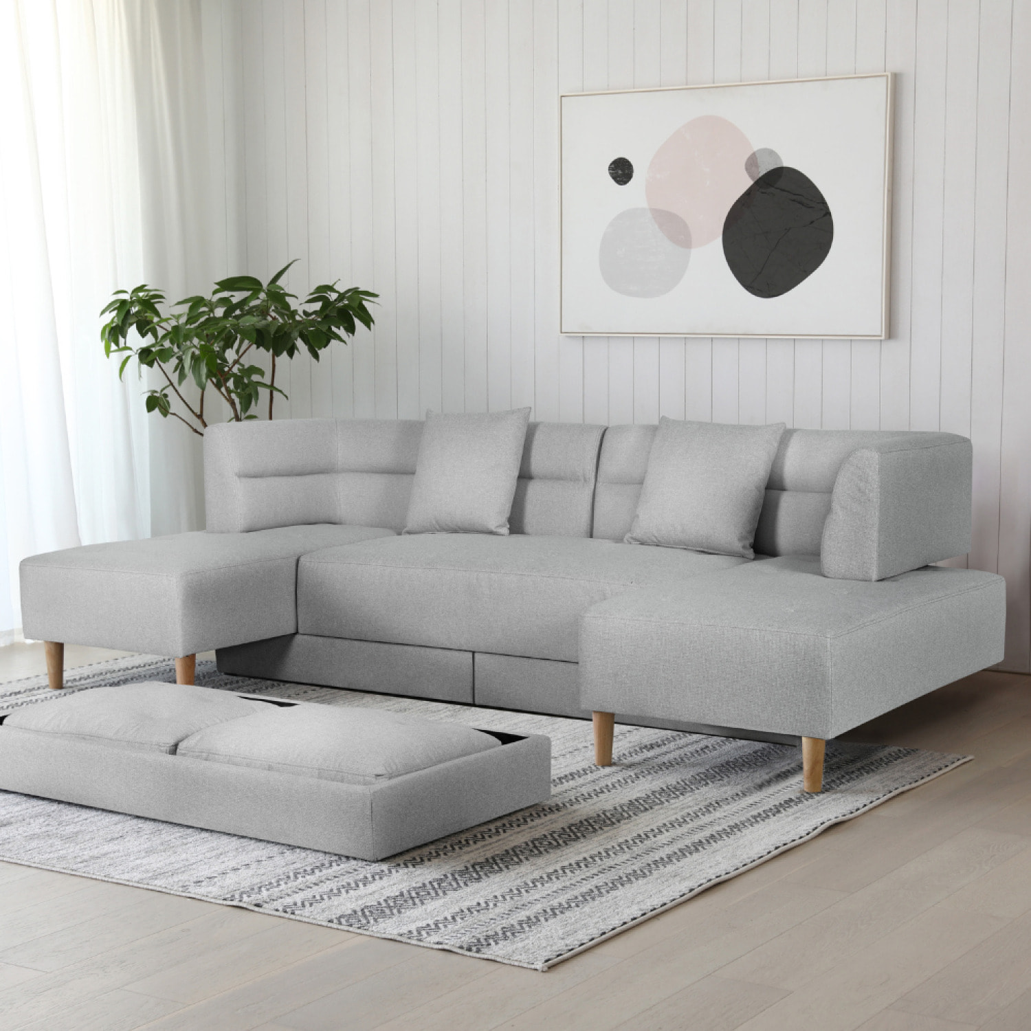 Canapé 4 places multifonction en tissu gris clair COLIN