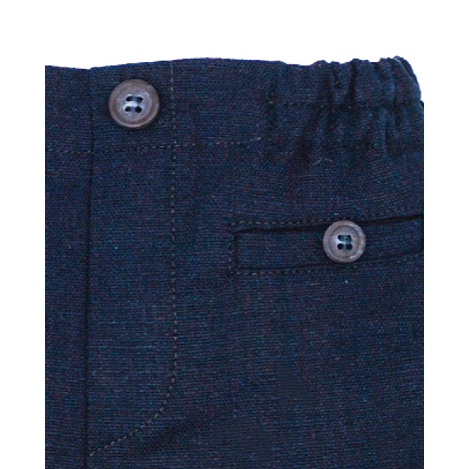 Bermuda de lino azul marino. Bolsillos falsos y botones, cintura elastica.