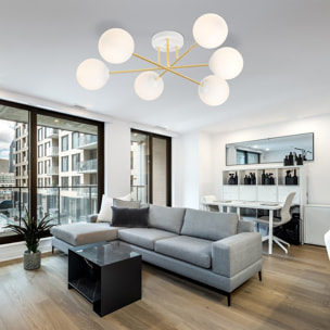 Lampada a sospensione Magnum con struttura oro e sfere in vetro