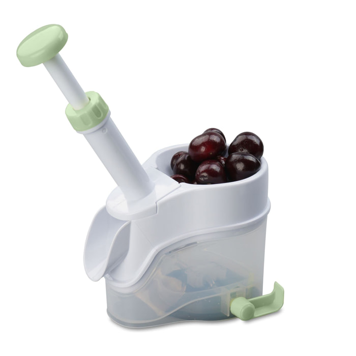 Dénoyauteur à cerise avec réservoir