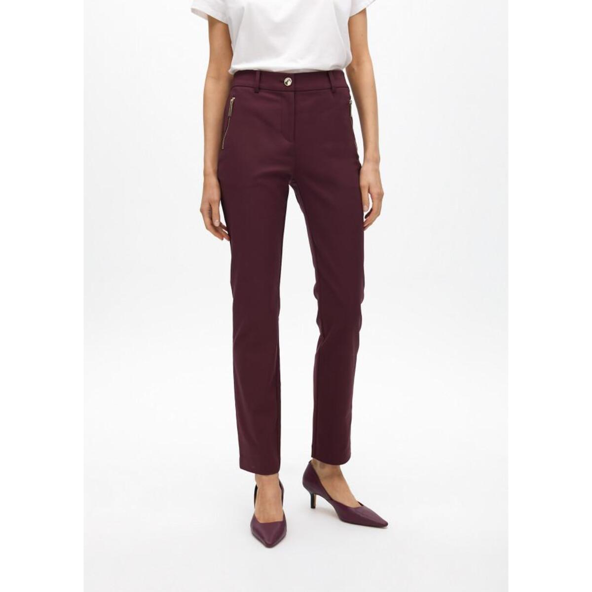 Pantaloni con tasche con zip in tessuto elastico