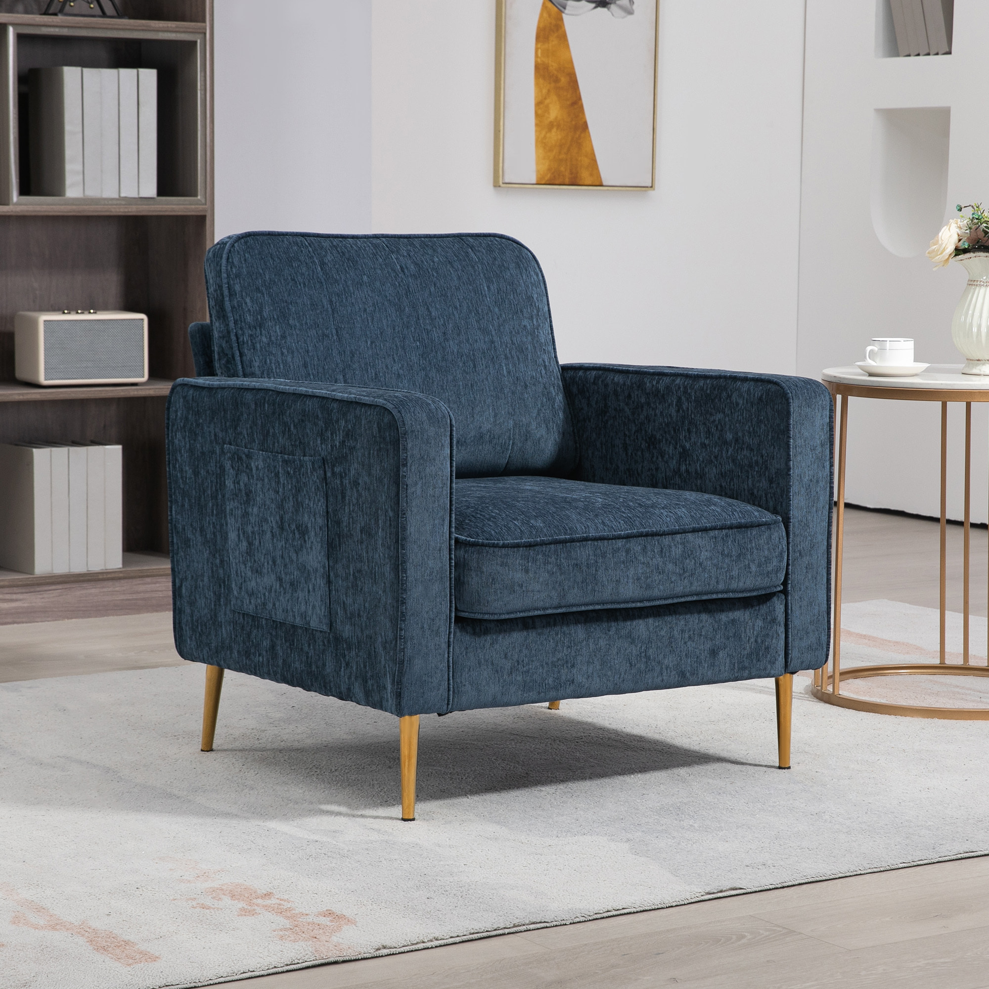 Fauteuil style art déco piètement métal doré tissu bleu