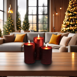 set de 3 velas led en color rojo de superficie rústica