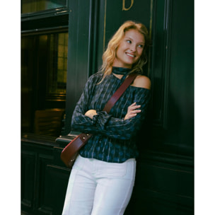 Blusa asimétrica con manga larga