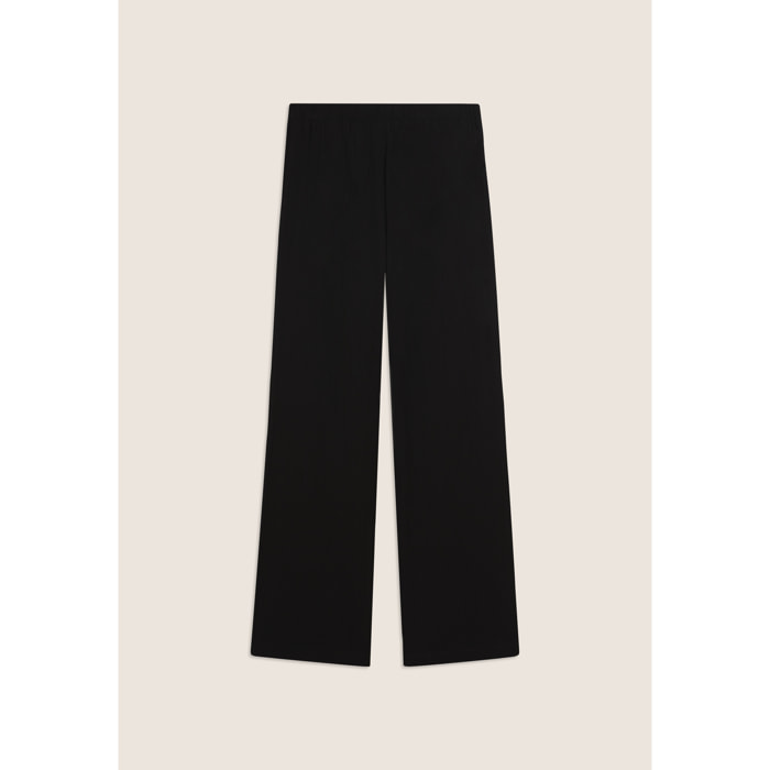 Pantaloni wide leg in tessuto crinkle fluido