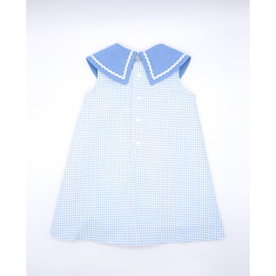 Vestido marinero de cuadros vichy azules. De tirantes cuello con detalle de picunela.