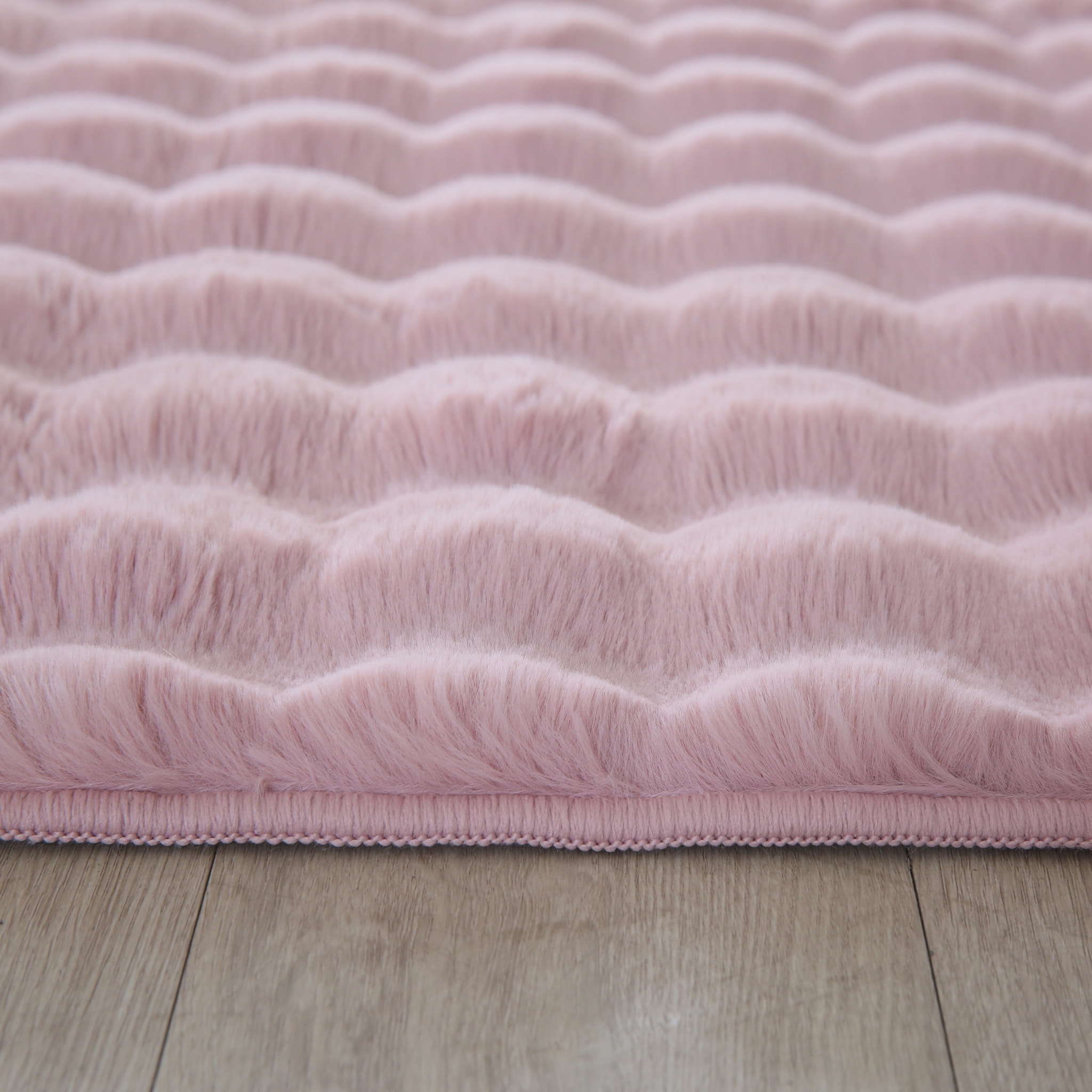 LAPONIE - Tapis uni doux en relief Rose