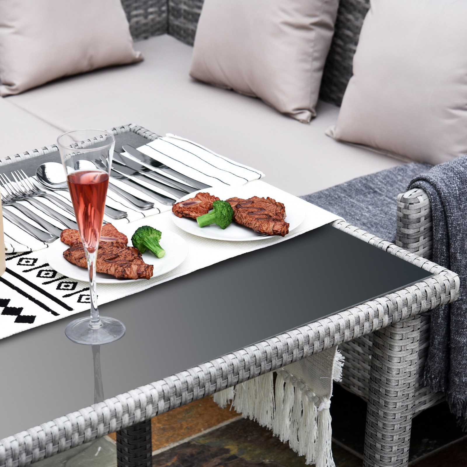 Salon de jardin 6 pers. canapé d'angle + 2 poufs + table à manger résine tressée gris