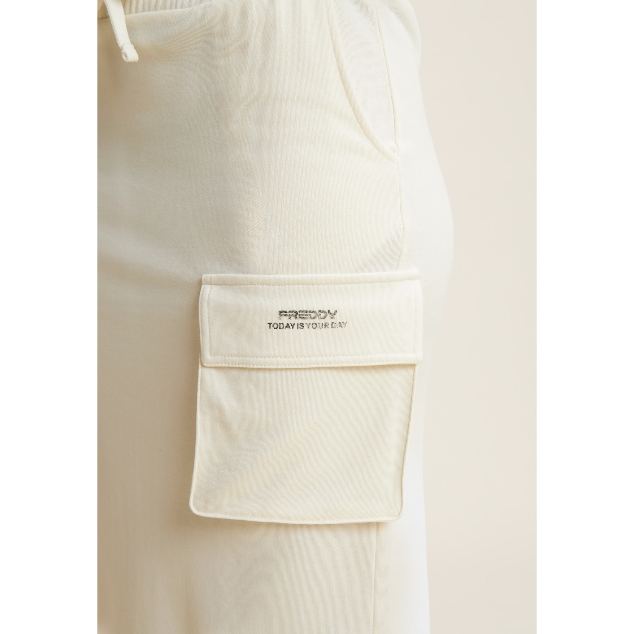 Gonna longuette con spacchi laterali e maxi tasca