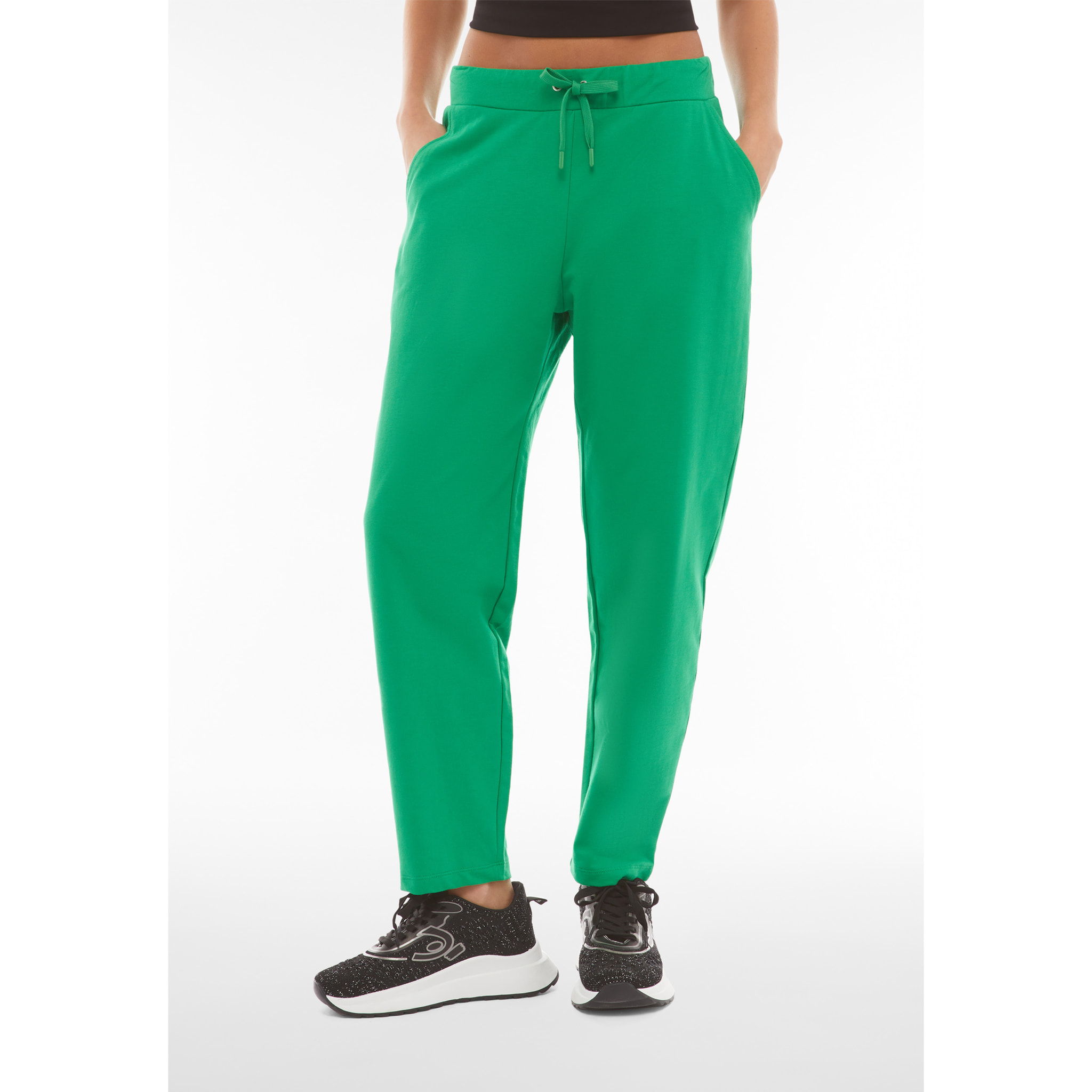 Pantaloni carrot fit in french terry con grafica sul fondo