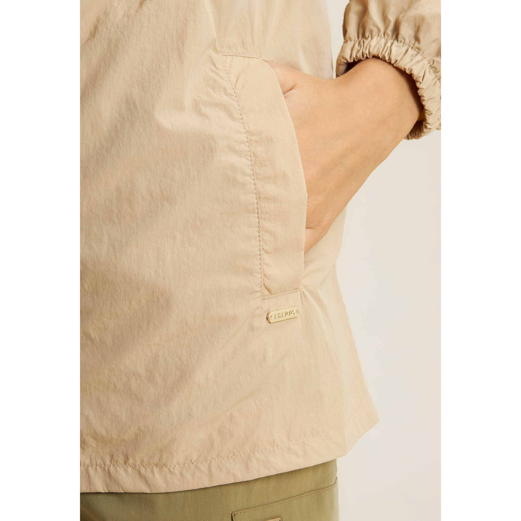 Parka donna collo alto in nylon con zip ed elastico in vita