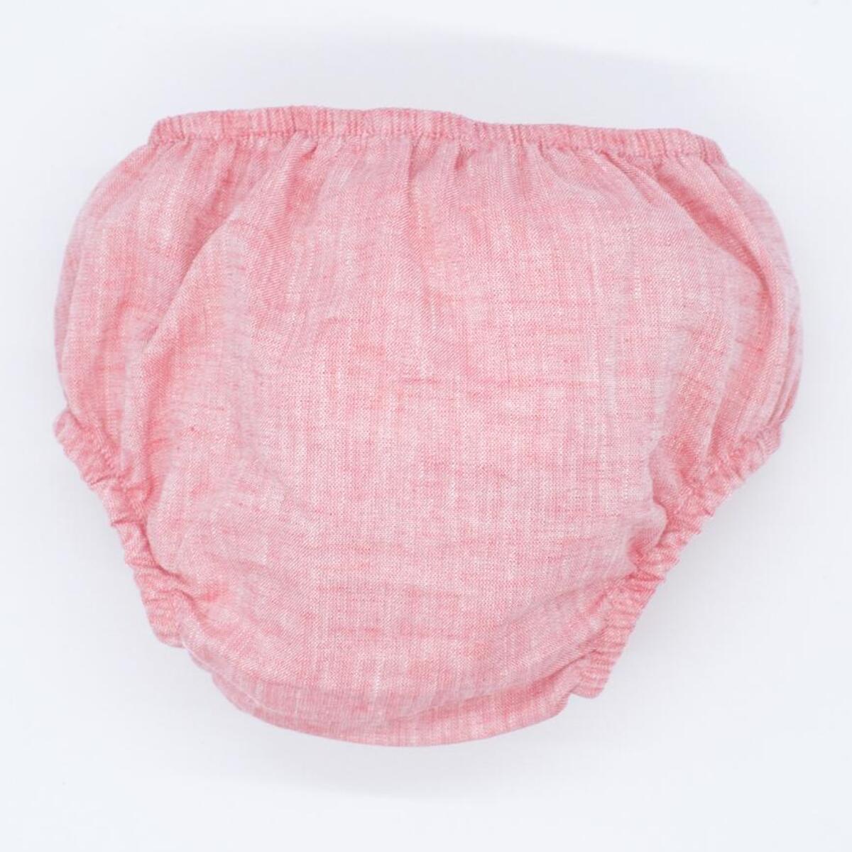 Cubrepañal rojo. Elastico en la cintura y en las piernas.