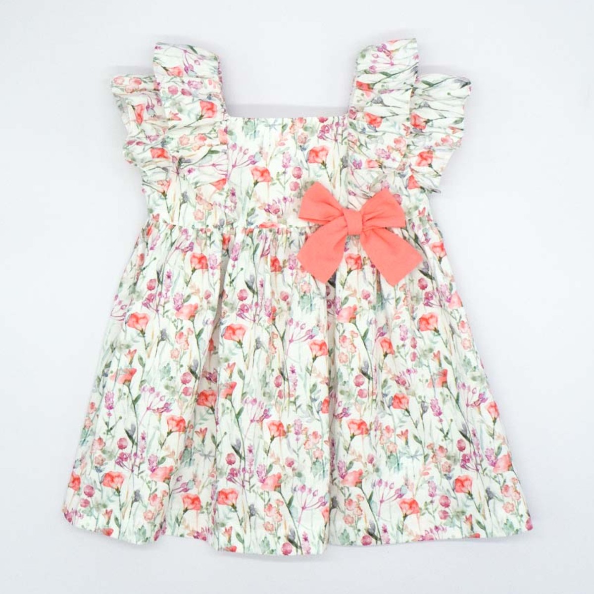 VESTIDO VOLANTE FLOR ROSA