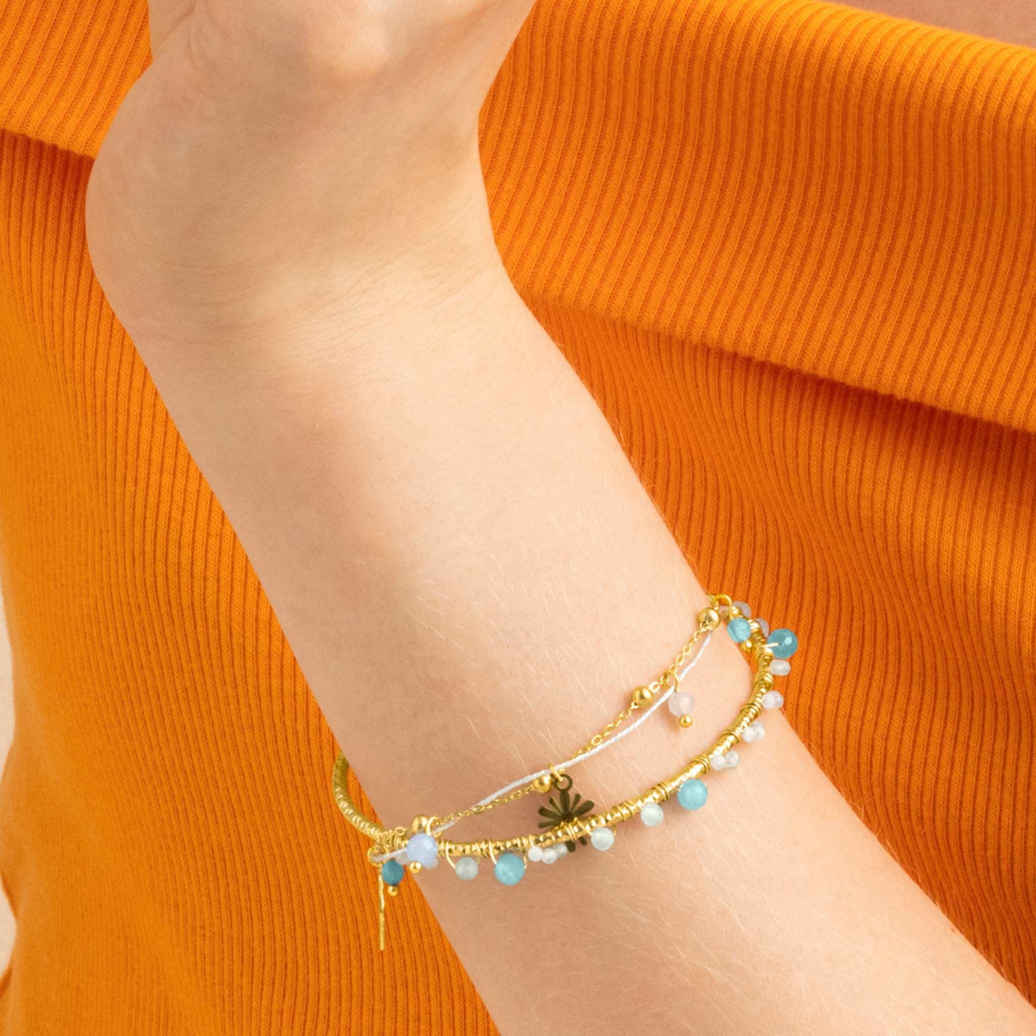 Pulsera con Cristal Azul Oscuro acabado oro 18k