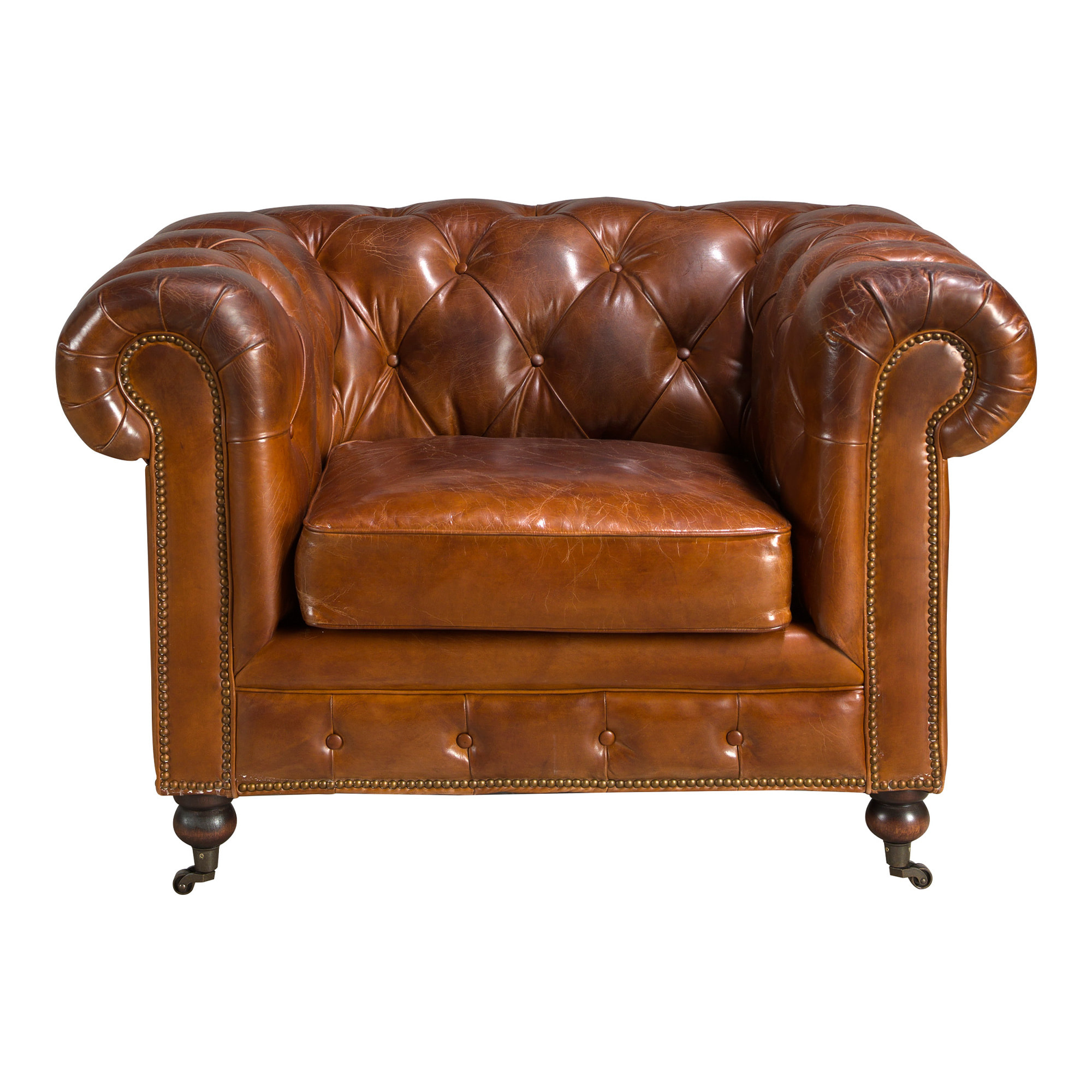 Sillón Chester con reposabrazos con asiento y respaldo tapizados en piel de origen vacuno en marrón coñac patas de madera maciza tintada en caoba 120x94x79cm