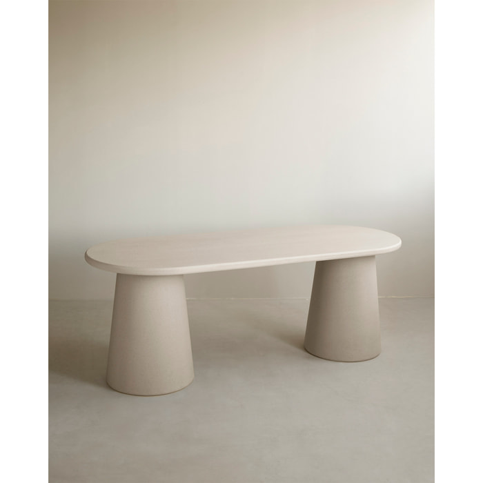 Table de salle à manger ovale en microciment ton beige en différentes tailles