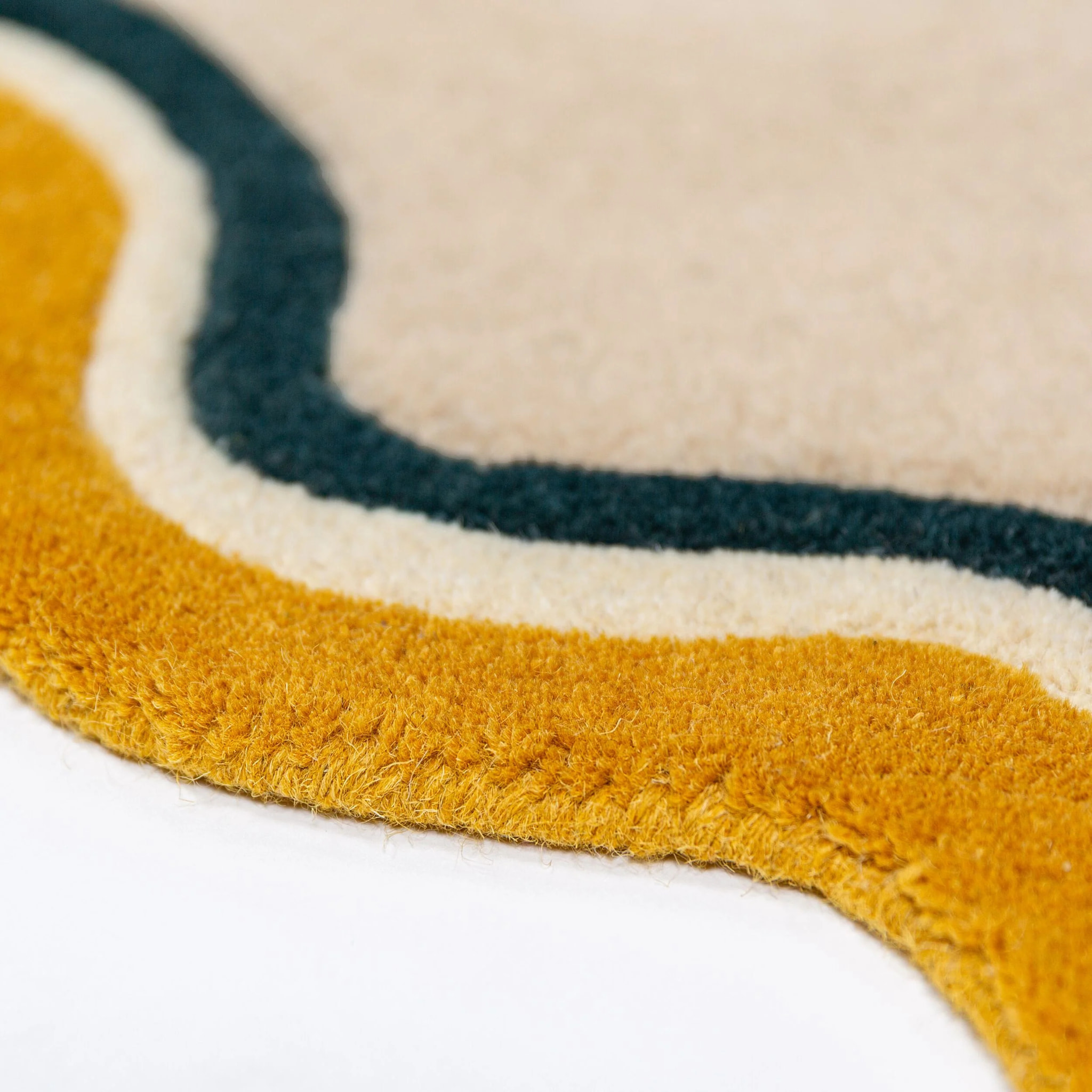 Tapis en laine rond LOIS SCALLOP