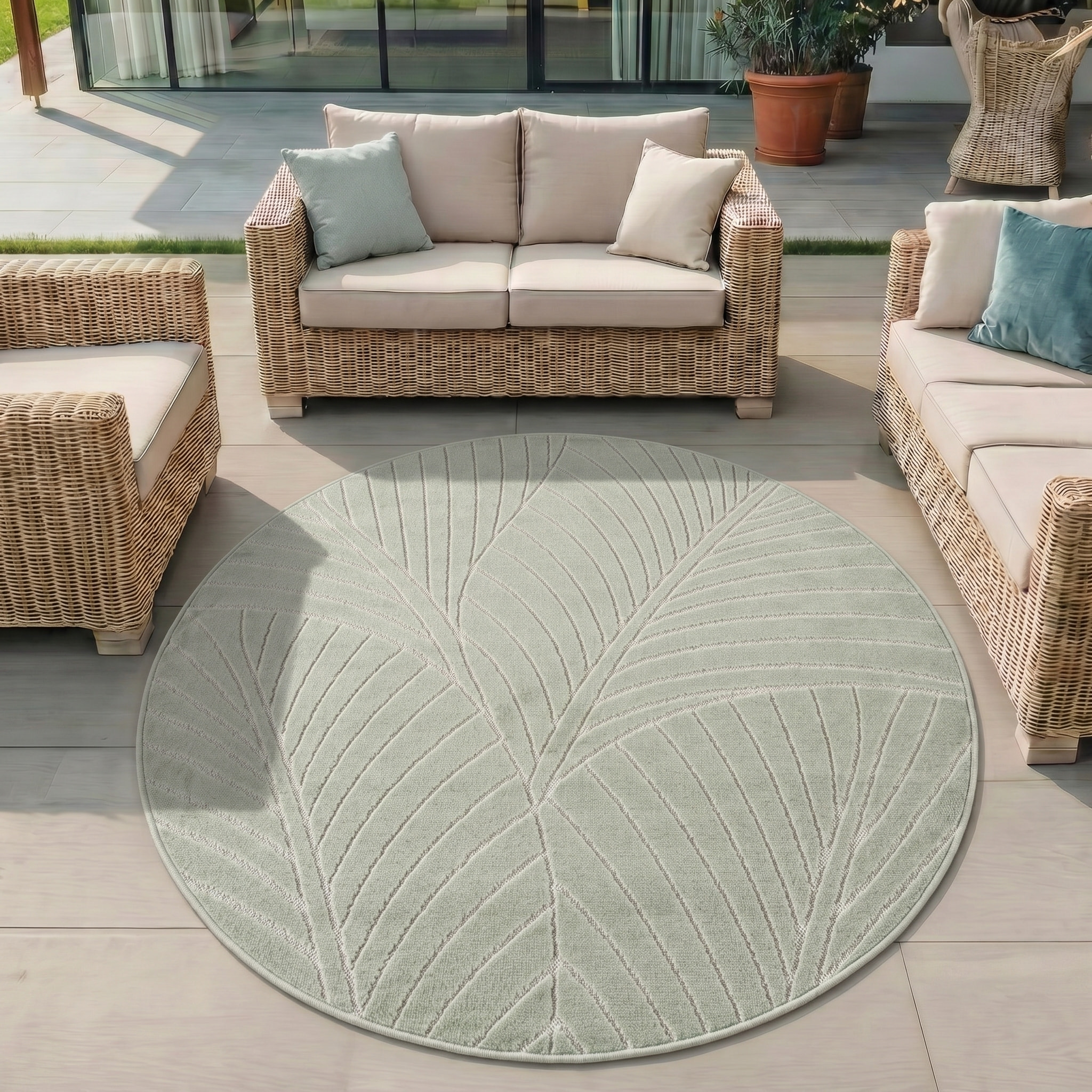 NOVA - Tapis intérieur/extérieur rond vert à motif feuilles