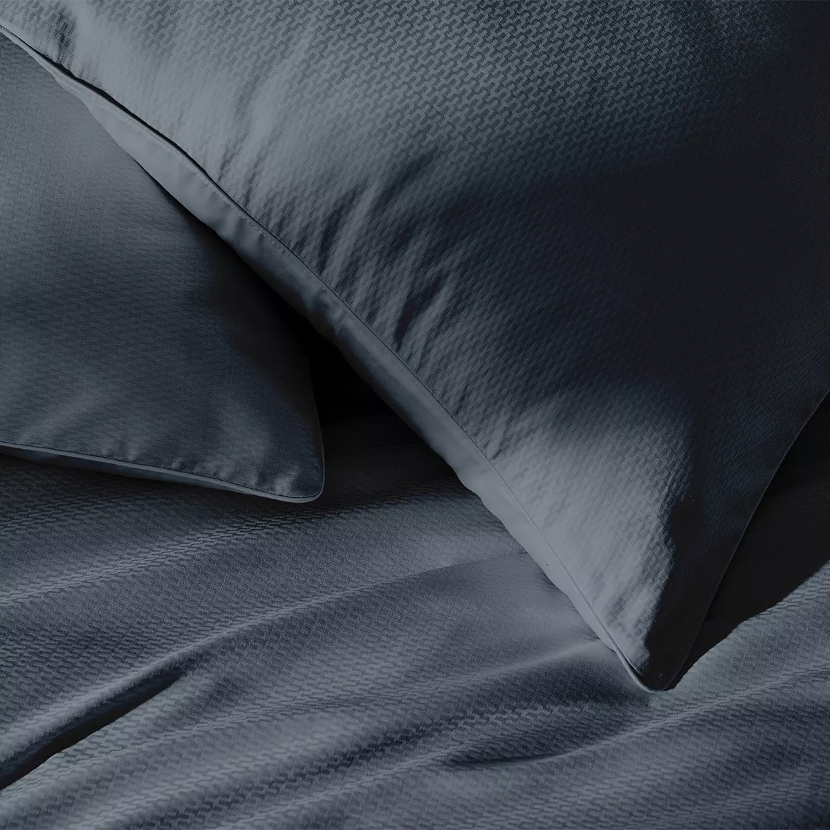 Taie d'oreiller satin de coton motif jacquard bleu Vibrato bleu nuit