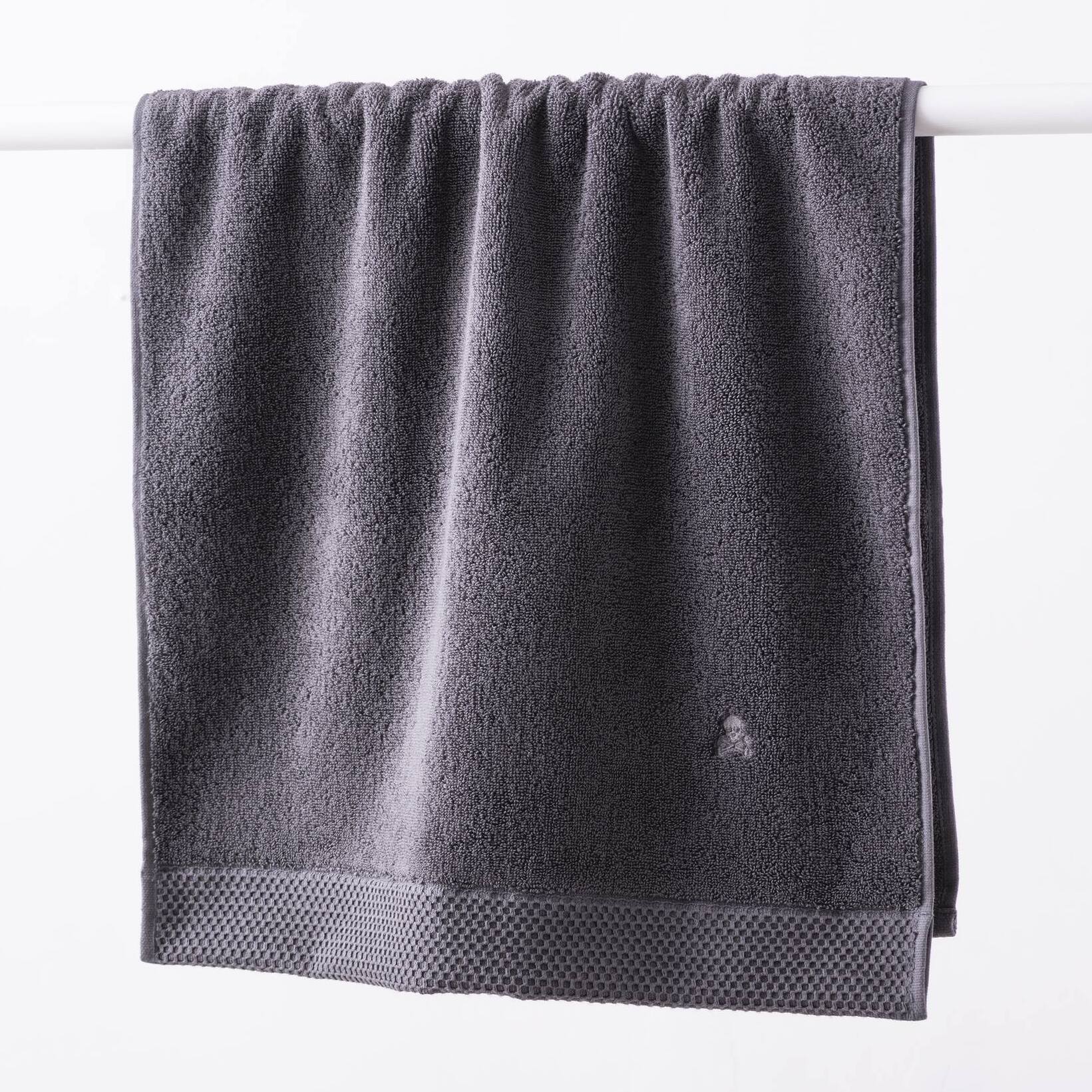 Juego de toallas nidus (30x50cm + 50x100cm + 90x150cm) 100% algodón en color gris con logo bordado scalpers home