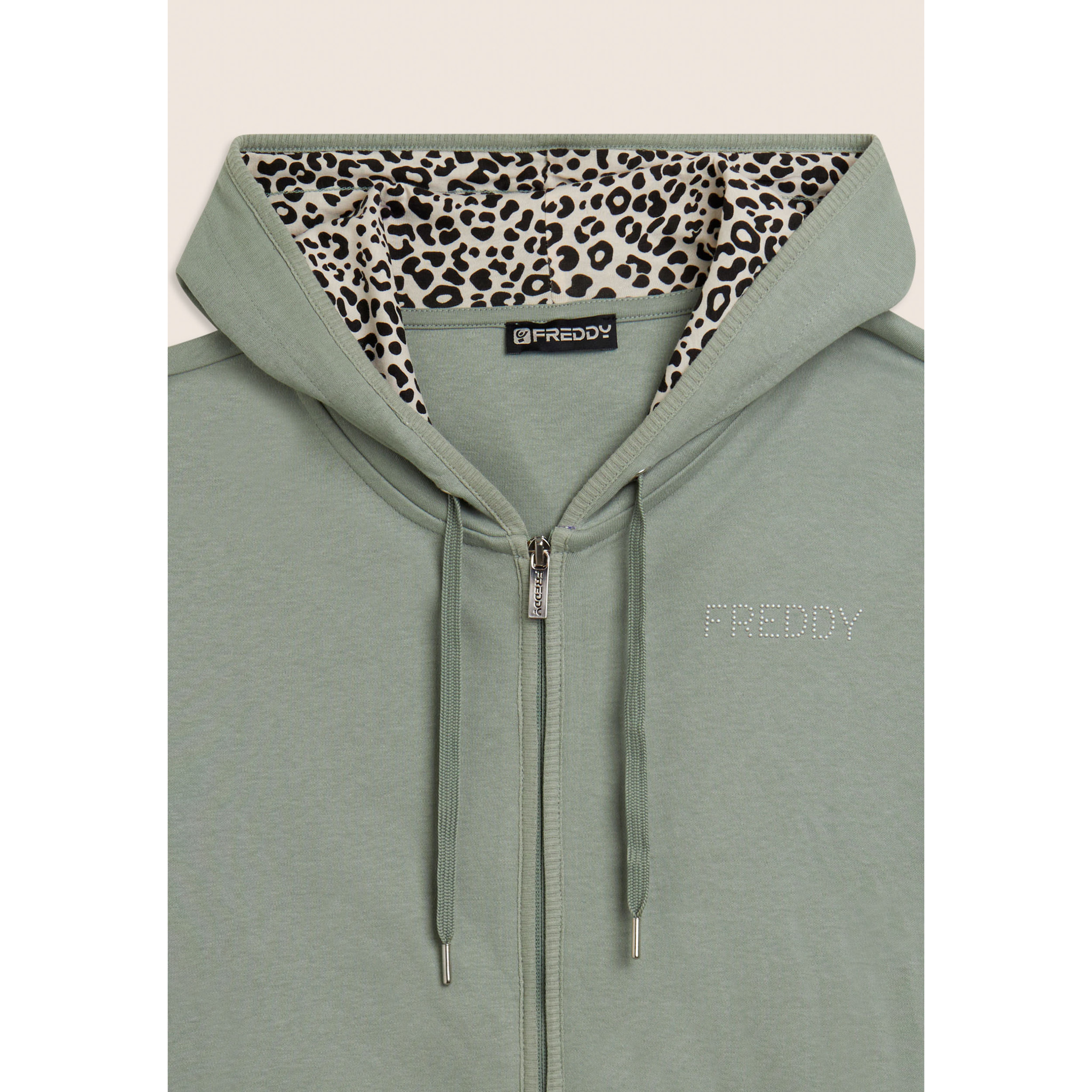 Tuta con zip e cappuccio con interno animalier