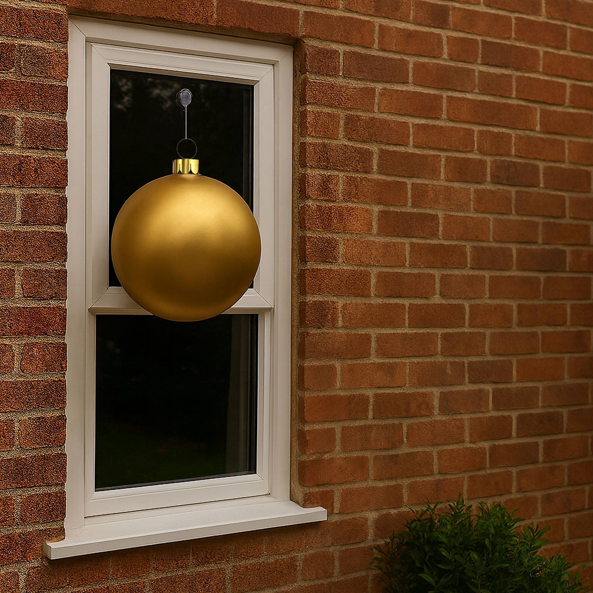 Bola de navidad inflable dorada de 4,5cm con ventosa