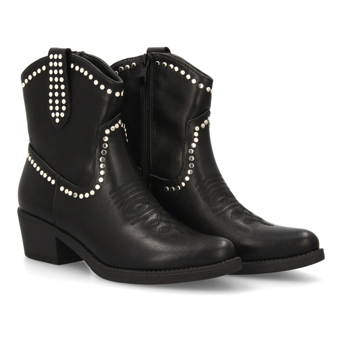 Botín cowboy con tachuelas para mujer.