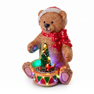 Oso navideño decorativo con tambor, luces led, movimiento y música con 8 villancicos, con usb incluido 19x19x25 cm