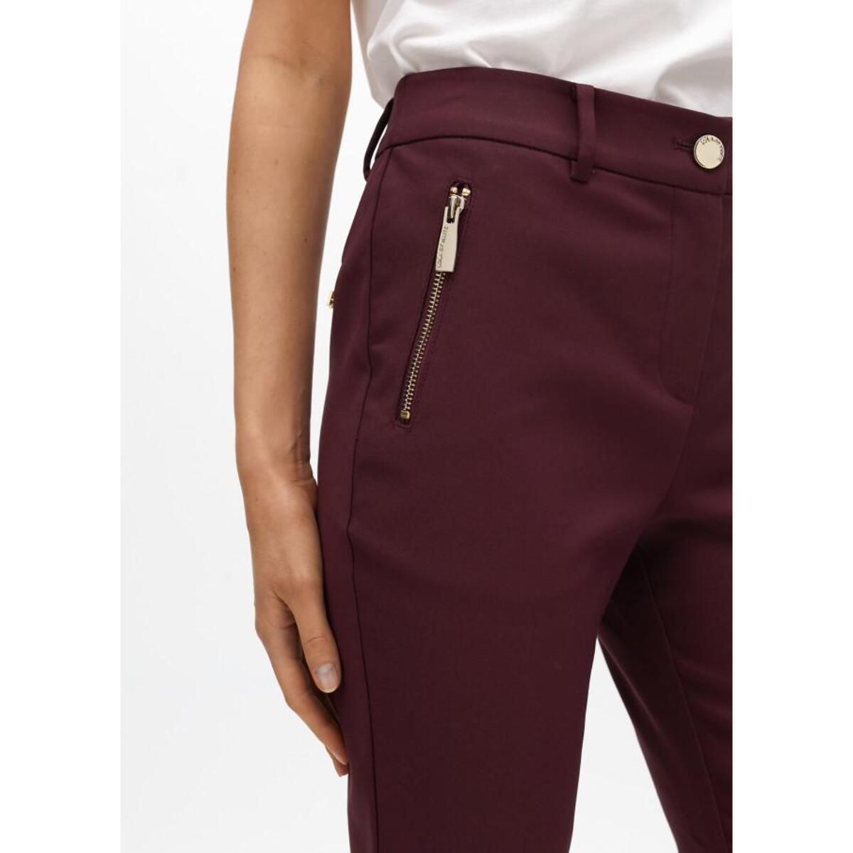 Pantaloni con tasche con zip in tessuto elastico