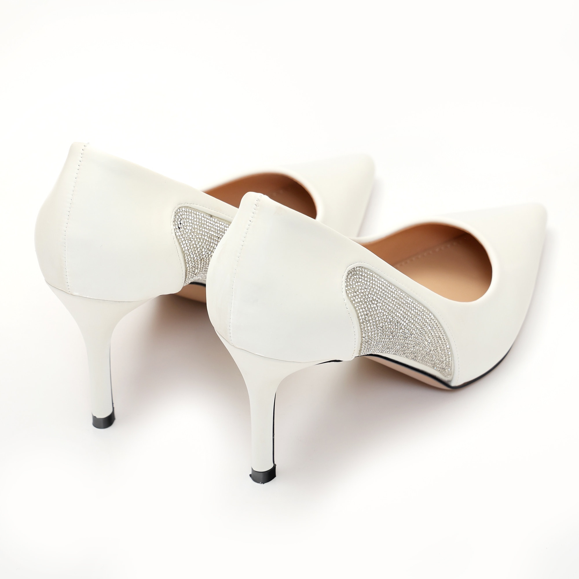 Dècolletè pumps in simil pelle verniciata con strass laterali