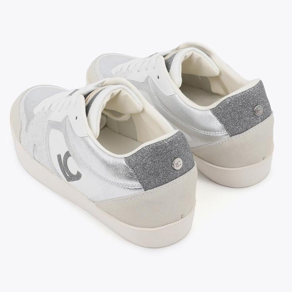 Scarpa sportiva con zeppa interna in tessuti abbinati e dettagli in pelle