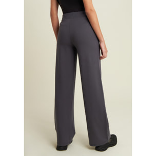 Pantaloni donna wide leg con dettagli micro-trecce