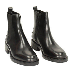 Botines chelsea negros de cuero