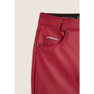 Pantaloni skinny in similpelle con logo ricamato