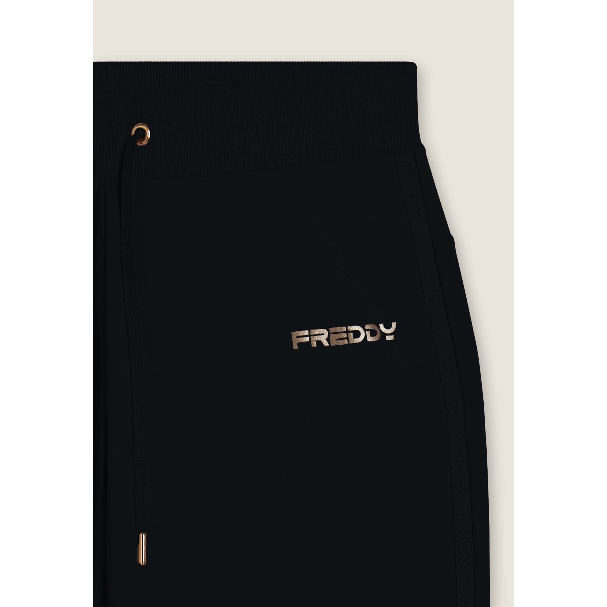 Pantaloni con fondo a costina e bande logate