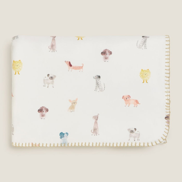 Manta polar con estampado de perritos Amiguis color blanco Poliéster