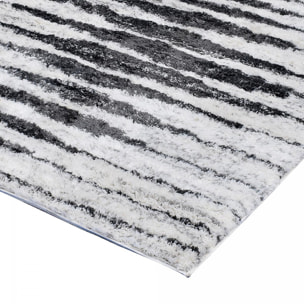 Tapis Shaggy longues mêches et aux motifs abstraits