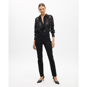 Pantaloni con tasche con zip in tessuto elastico