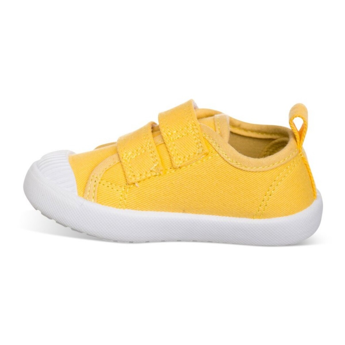 Lona color amarillo, fácil de combinar, con dos Velcros, puntera de goma y gran flexibilidad
