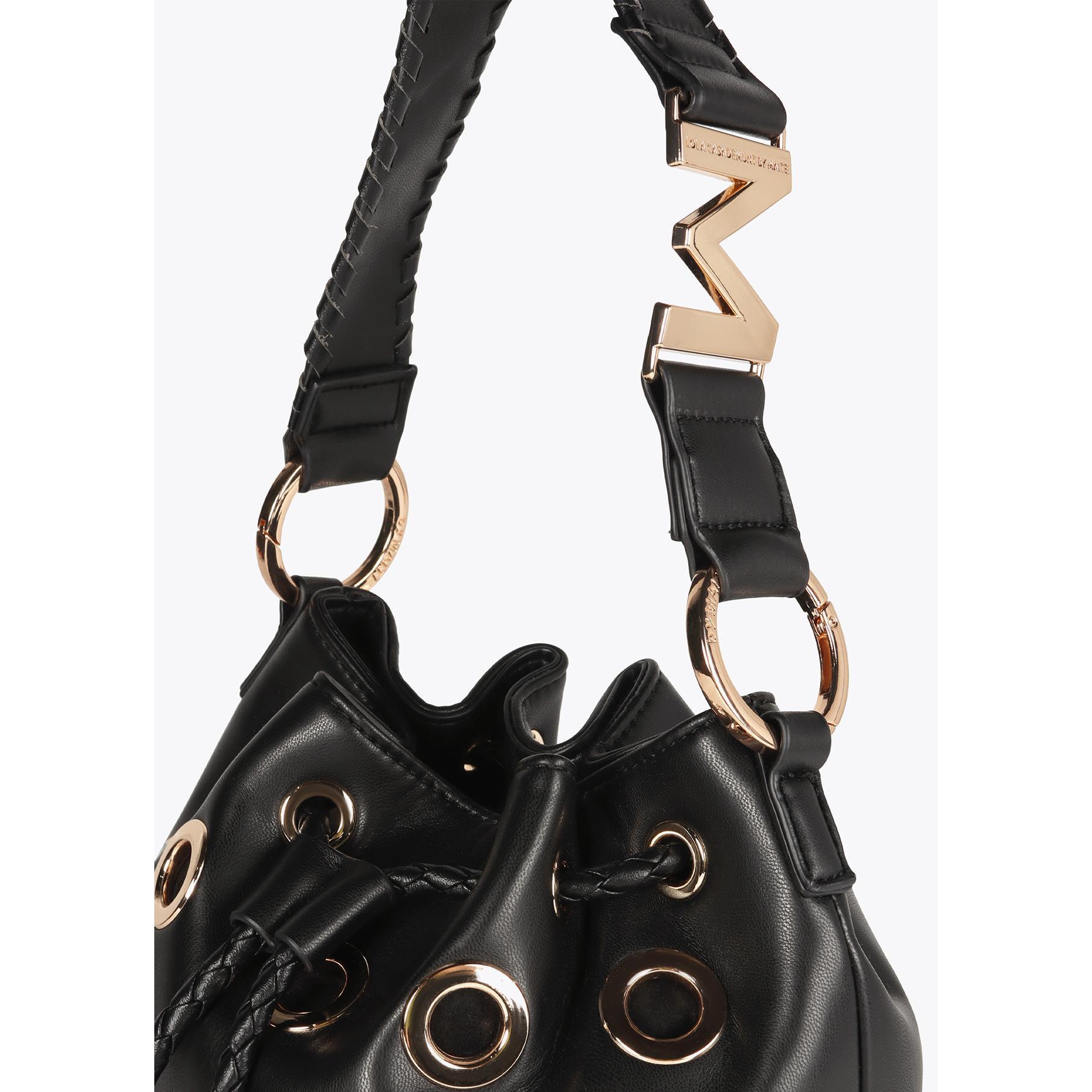 Borsa con Occhielli Metallici Circolari