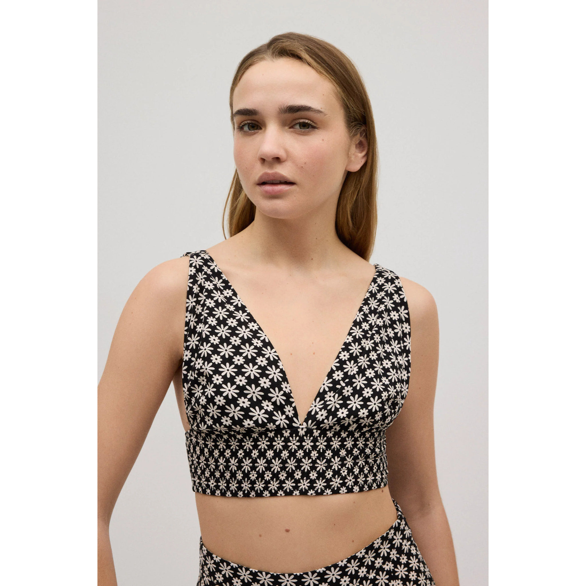Crop top a nido d'ape con spalline elastiche a stampa floreale