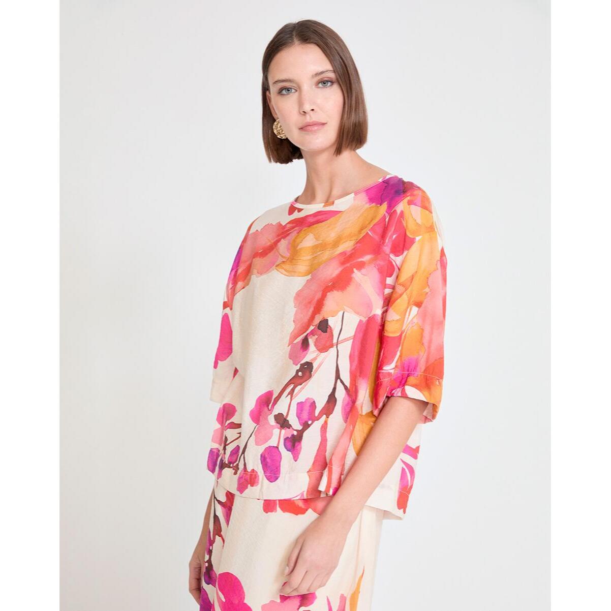 Blusa a maniche corte con stampa floreale