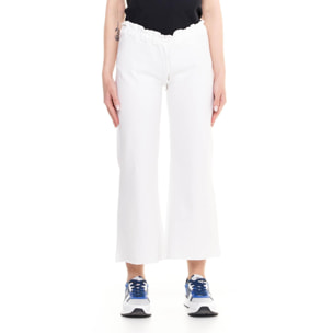Pantalones deportivos de mujer brillantes hasta los tobillos