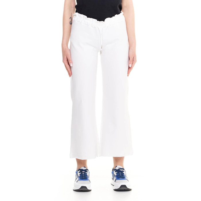 Pantalones deportivos de mujer brillantes hasta los tobillos