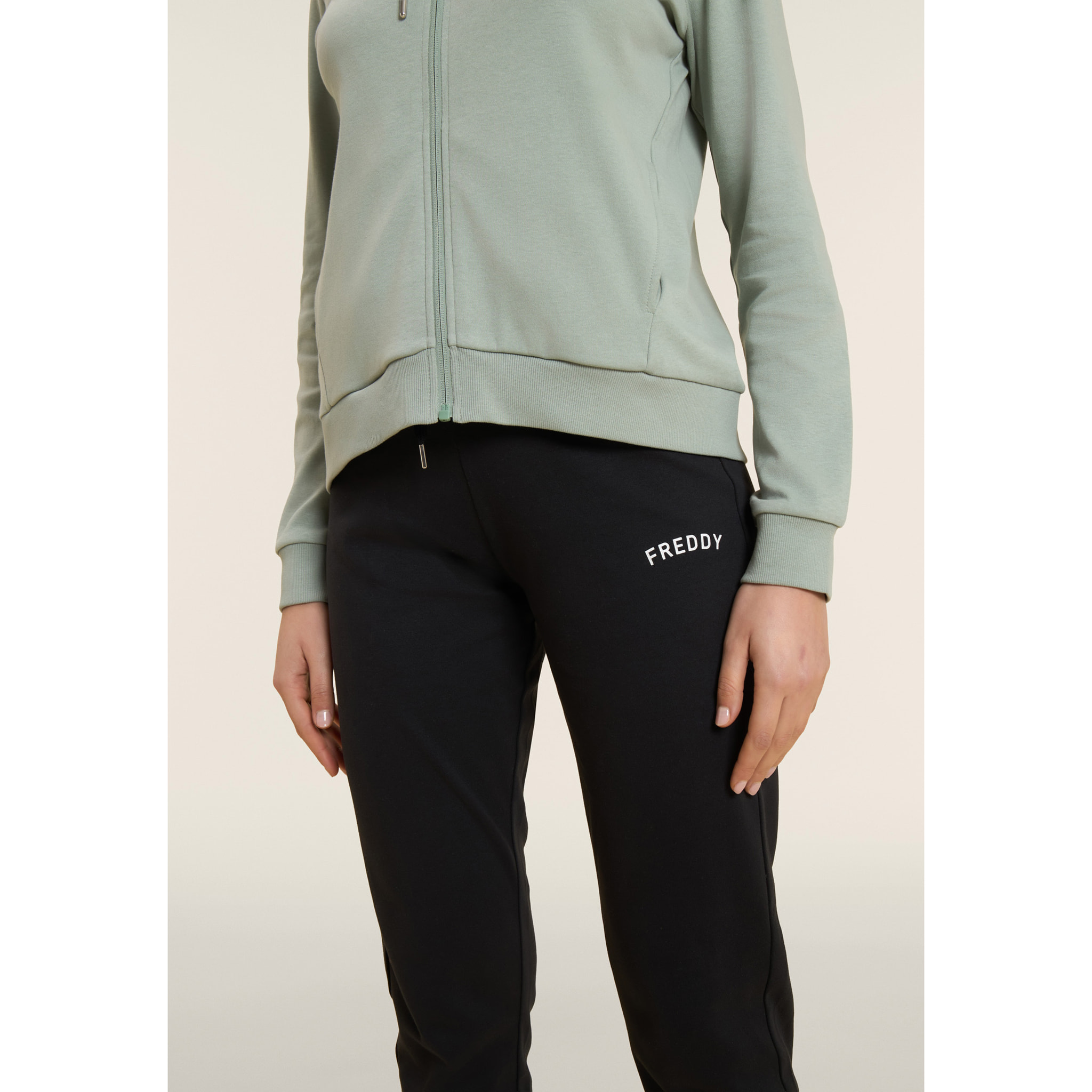 Tuta con zip e collo alto con interno animalier