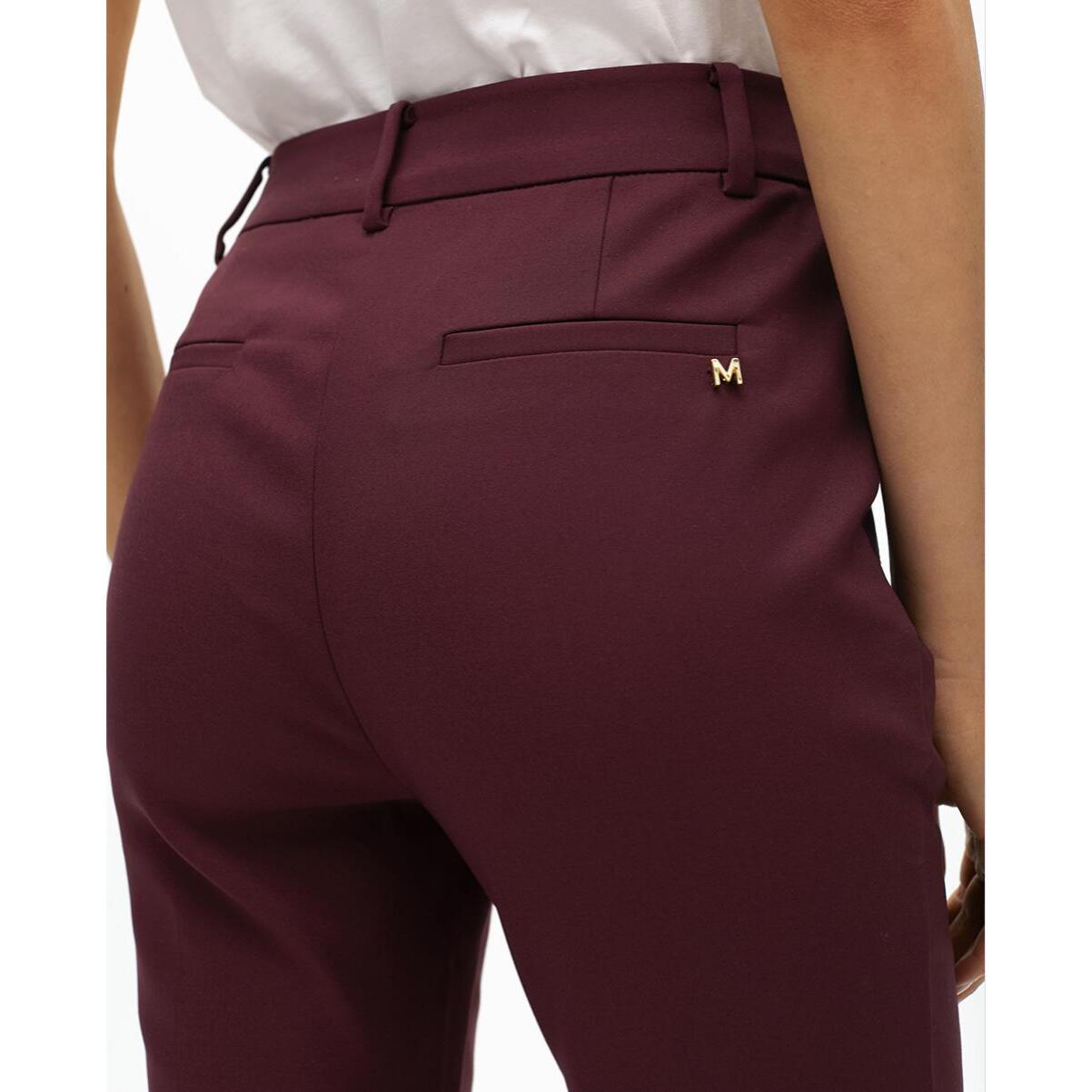 Pantaloni con tasche con zip in tessuto elastico