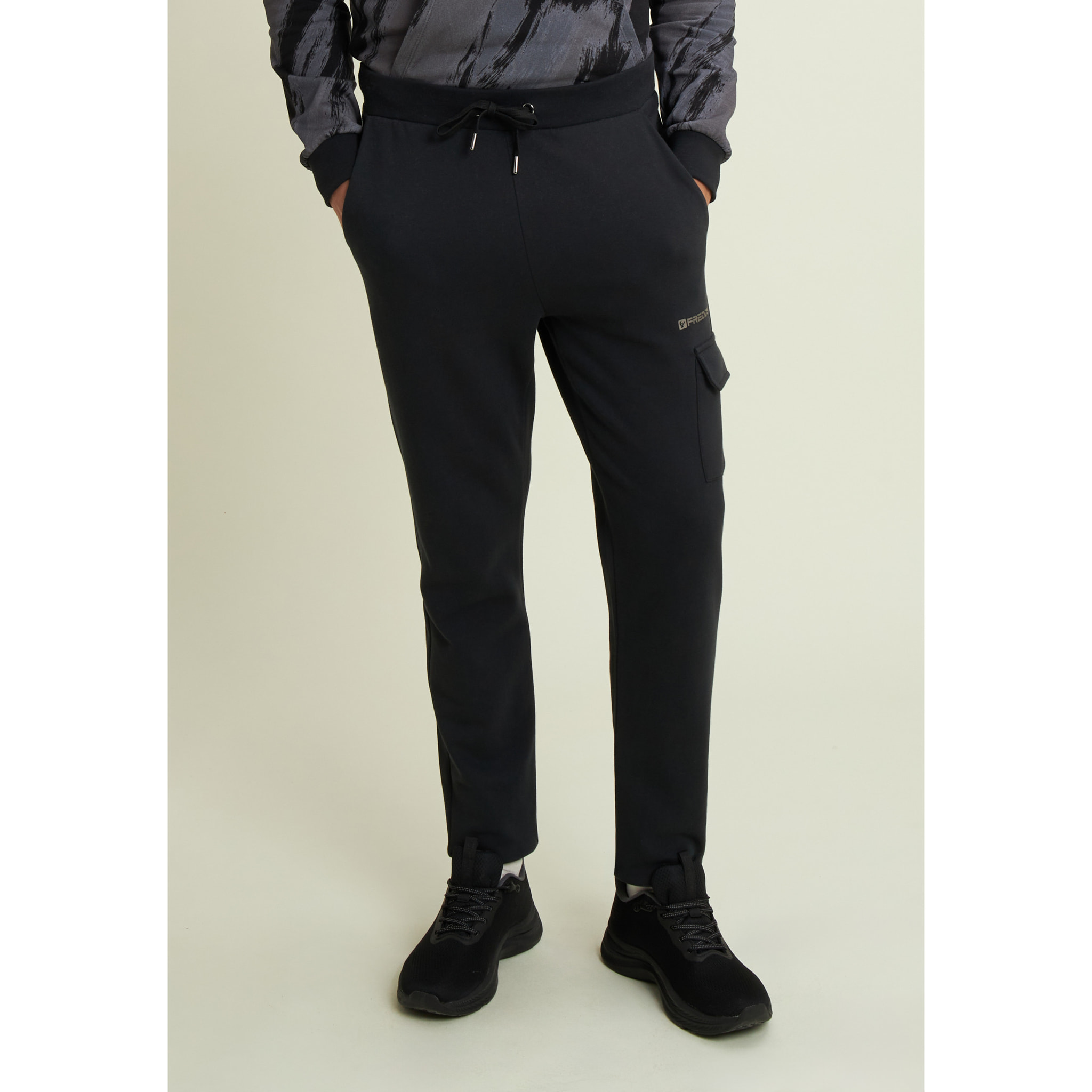 Pantaloni in felpa con tasca cargo e fondo a polsino