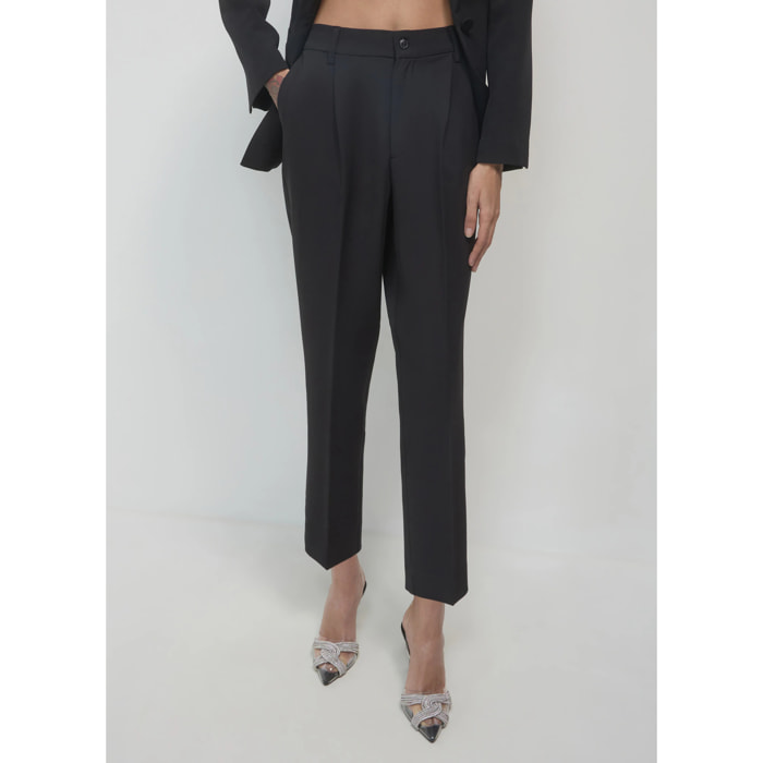 Pantaloni tinta unita