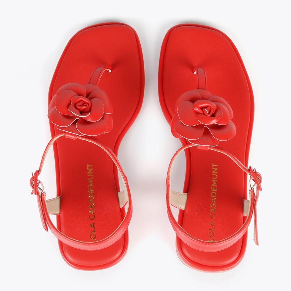 Sandali con fascetta infradito e fiore