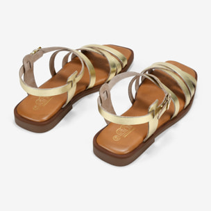 Sandalias planas doradas en piel con hebilla